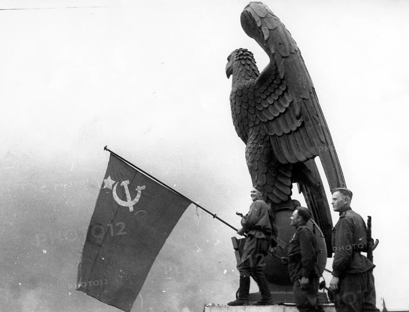 J. Chaldej arrived in Berlin with three Soviet flags. The first flag was raised at Tempelhof Airport. May 2, 1945, Berlin, Germany