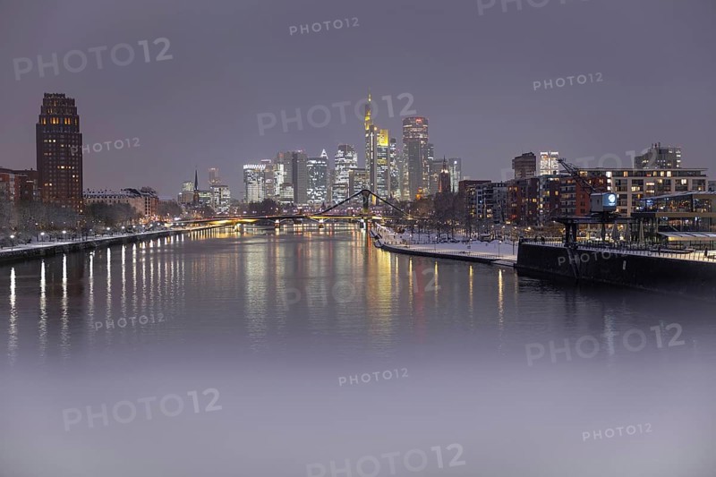 There is snow on the banks of the Main from the Wesel shipyard to the Frankfurt banking skyline, Osthafen, Frankfurt am Main, Hesse, Germany