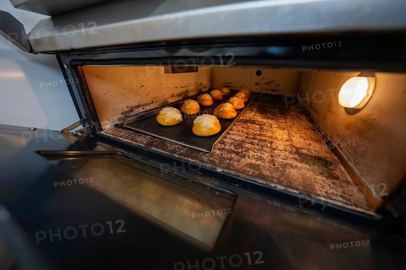Baking tray with rolls in the oven during the baking process, baking rolls, Haselstaller Hof, Gechingen, Germany