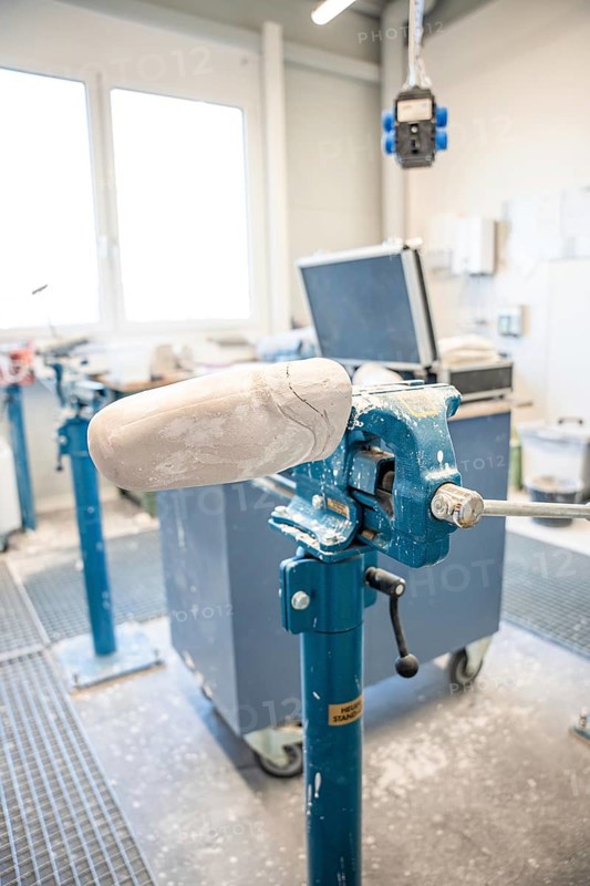 Workbench with plaster model for prosthesis production in a bright environment, medical supply store