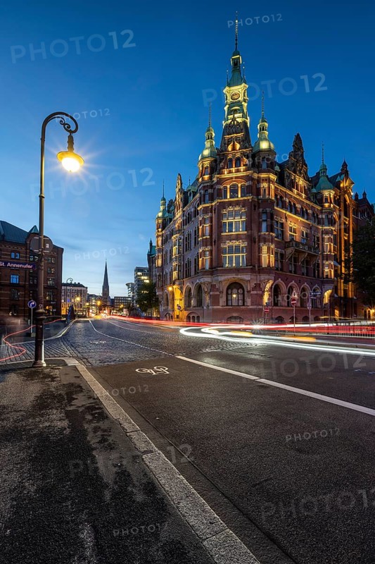 Speicherstadtrathaus in Speicherstadt with road traffic at the blue hour, Hamburg, Germany