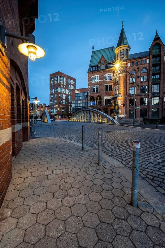 Walkway with lantern in Speicherstadt at the blue hour, Hamburg, Germany