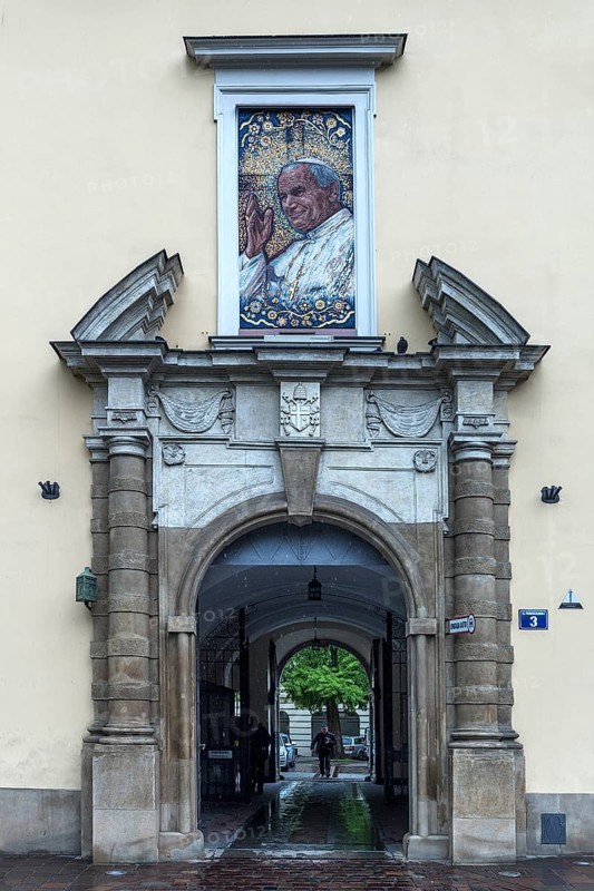 Mosaic portrait of Pope John Paul II above an entrance portal, Krakow, Poland