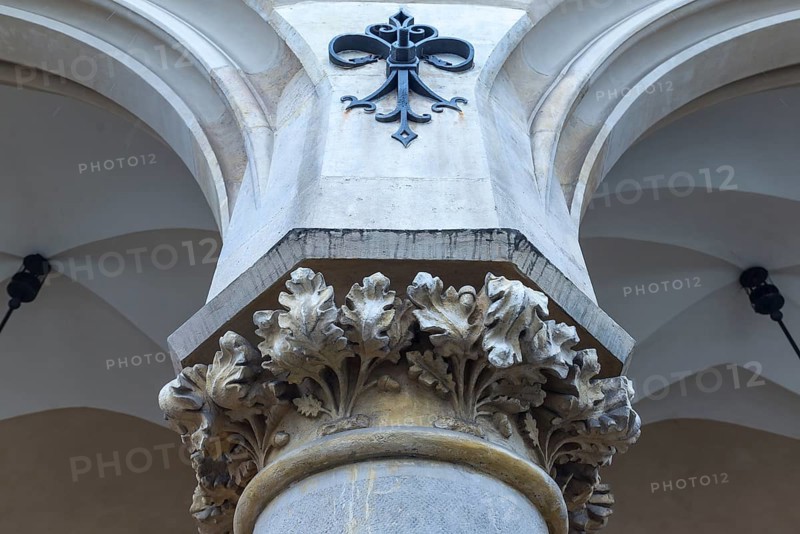 Relief of arcant leaves on the pillars of the arcades of the Cloth Hall, Krakow, Poland