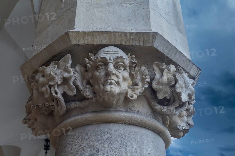 Reliefs on the pillars of the arcades of the Cloth Hall, Main Market Square, Krakow, Poland