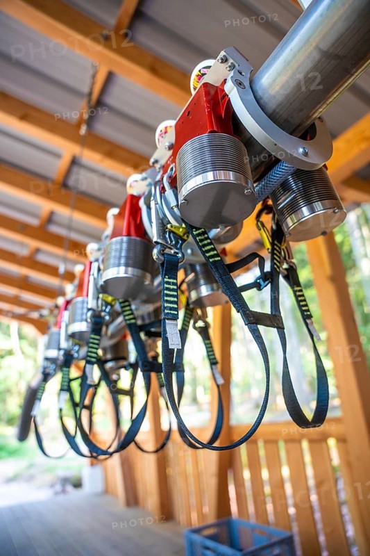 Close-up of safety equipment with straps and metal parts in a wooden structure, Himmelsglück observation tower with flying fox, Schömberg, Black Forest, Germany