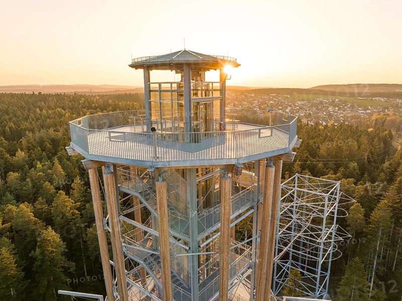 Higher view of the observation tower and surrounding forests in sunlight, Himmelsglück observation tower with Flying Fox, Schömberg, Black Forest, Germany