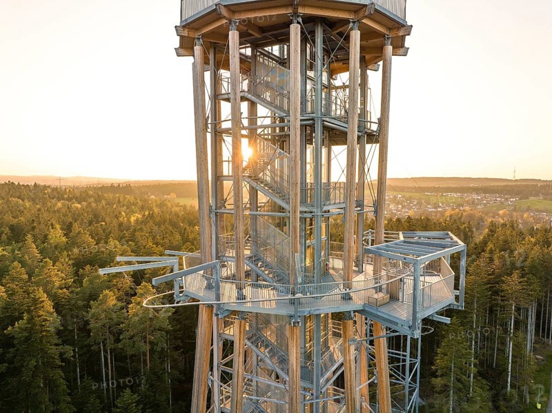 Metal observation tower at sunset surrounded by thick forests, Himmelsglück observation tower with Flying Fox, Schömberg, Black Forest, Germany