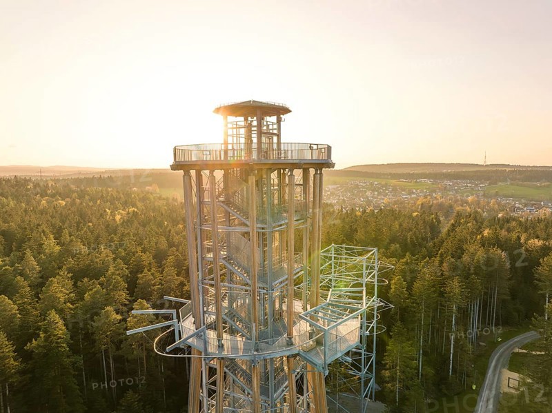Detailed view of a modern tower, sunlight penetrating the structure in a forest, Himmelsglück observation tower with flying fox, Schömberg, Black Forest, Germany