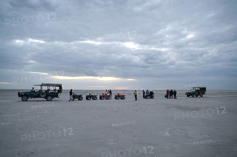 Tourists on a quad bike tour to the Makgadikgadi Salt Pans, Makgadikgadi Pans National Park, Gweta, Central District, Botswana