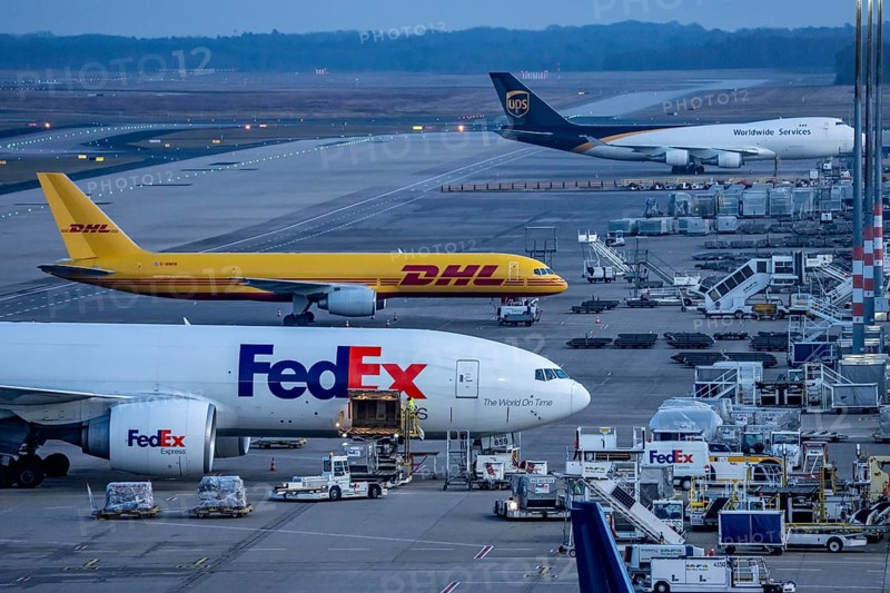 Air freight center, FedEx Boeing 777-FS2, DHL flieger, UPS Boeing 747, jumbo jet, cargo aircraft, at Cologne/Bonn airport, North Rhine-Westphalia, Germany