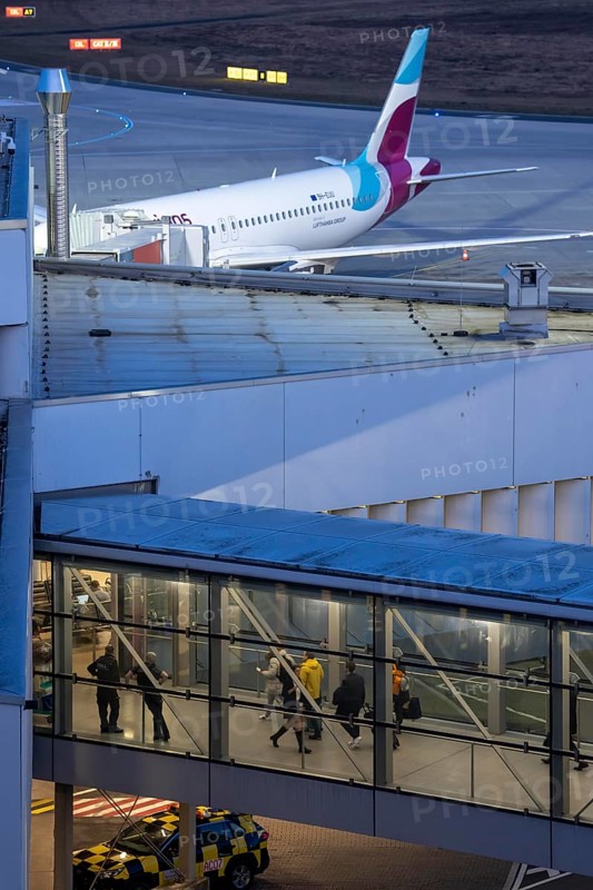 Eurowings Airbus at the gate, passenger on the way to the gate, Cologne/Bonn Airport, North Rhine-Westphalia, Germany