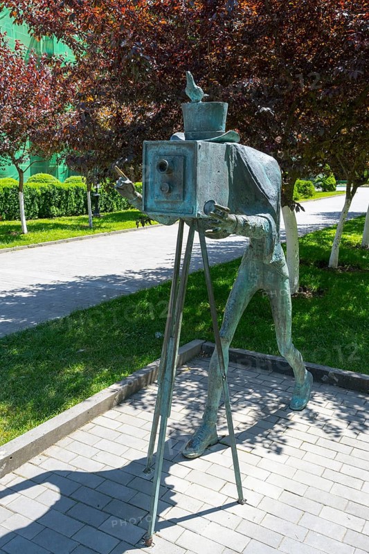 Bronze statue of a photographer with an antique camera in a park, statue in Borjomi Park, Borjomi resort, Kura River, Samtskhe-Javakheti region, Lesser Caucasus, Georgia
