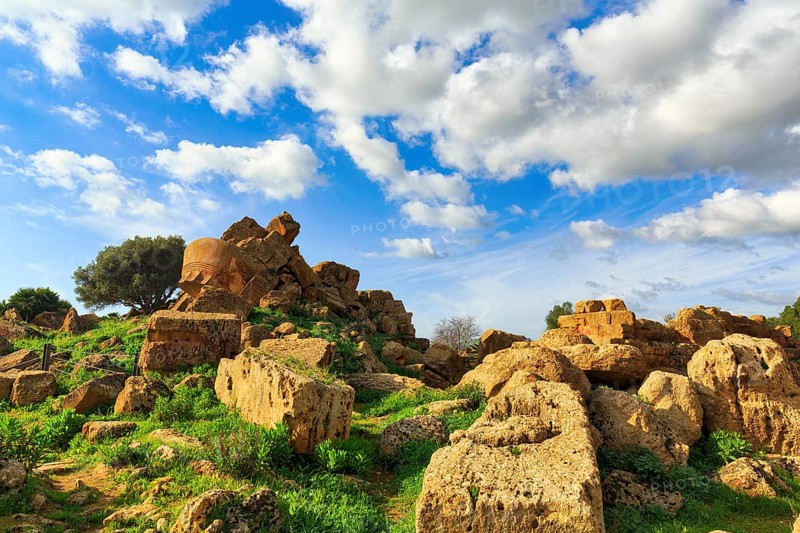 Rubble field, destruction, ruins, temple of Olympian Zeus with display board, Telamon, Cumulus, Valley of the Temples, Agrigento, Sicily, Italy