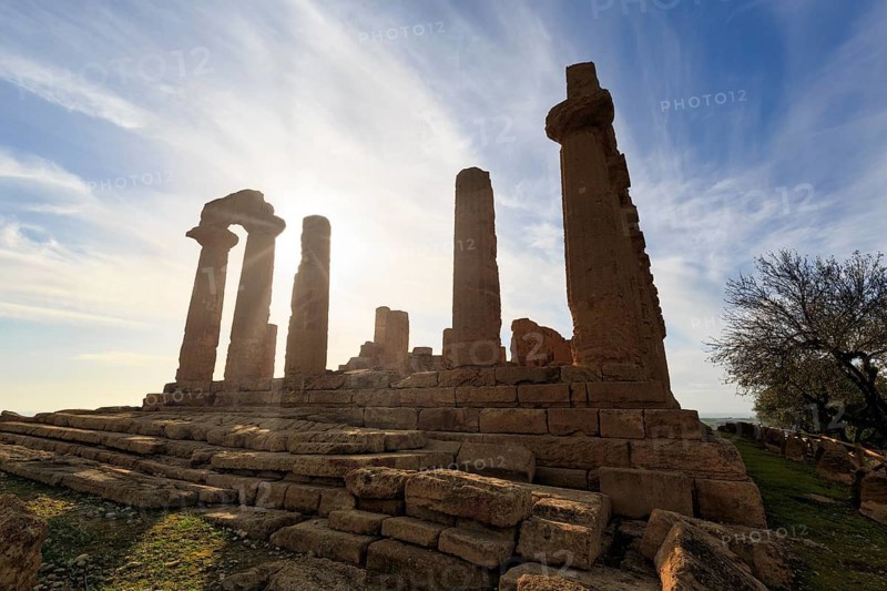 Temple of Heracles, ruins in the Valley of the Temples, restoration, backlight, sunbeams, Valley of the Temples, Agrigento, Sicily, Italy