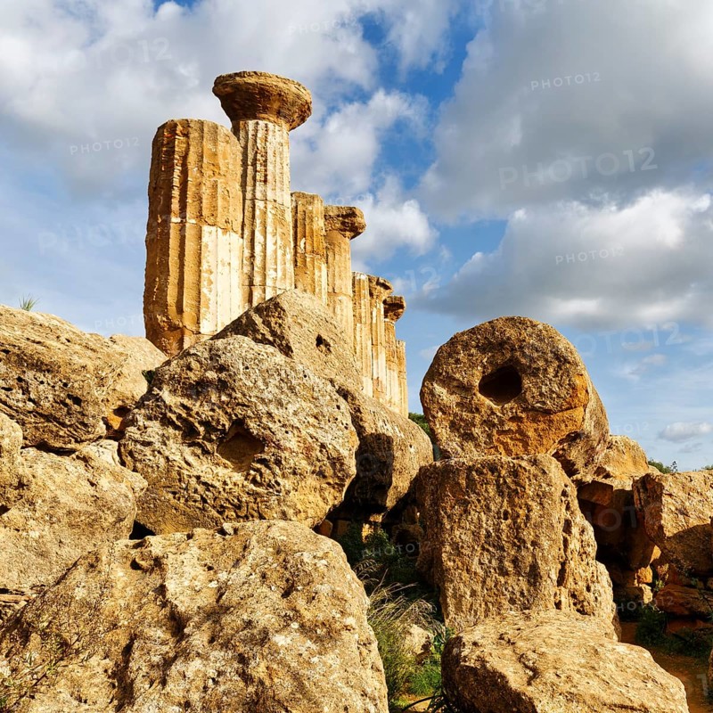 Columns, boulders, Temple of Heracles, ruin in the Valley of the Temples, Cumulus, Agrigento, Sicily, Italy