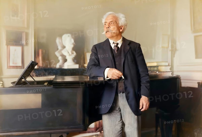 Gabriel Fauré, 1845 – 1924, French composer, next to his piano in his appartement, Boulevard Malesherbes, Paris, digitally edited according to a photograph by Dornac