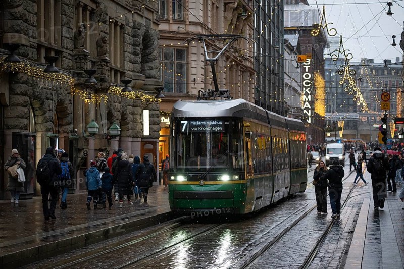 Alexanterinkatu, main shopping street in the city center, designed by Carl Ludwig Engel, with Stockmann department store, Christmas decoration, tram, Helsinki, Finland
