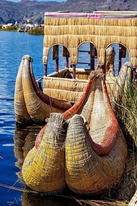 Traditional boats made of reeds on a lake, handmade, The floating reed islands of the Uros in Lake Titicaca in Peru