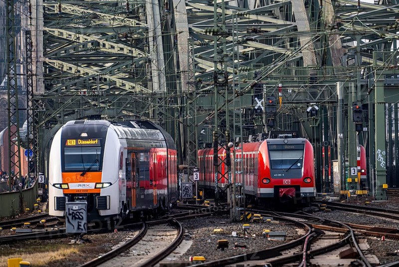 Rail system in front of Cologne Central Station, Hohenzollern Bridge across the Rhine, RRX, Rhine-Ruhr Express, regional train, regional trains, in front of the railway bridge, Cologne, North Rhine-Westphalia, Germany