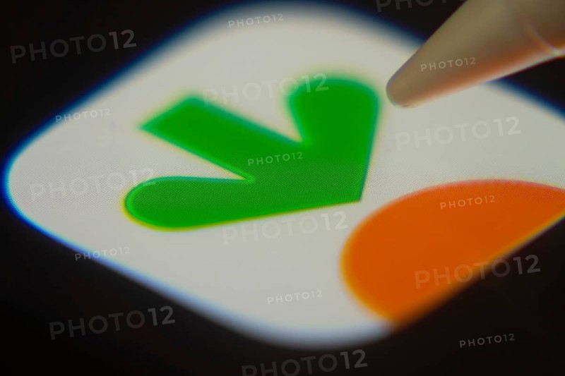 Dhaka, Bangladesh- 06 Dec 2025: Close-up of the Instacart app on a screen with a stylus pointing at it