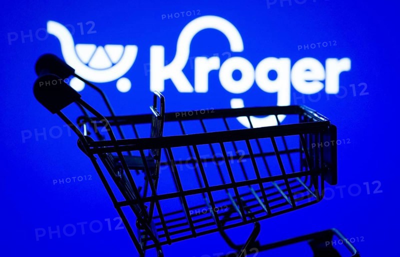 Dhaka, Bangladesh- 03 July 2025: Silhouette of a shopping cart in front of the Kroger logo, symbolizing ecommerce and online shopping