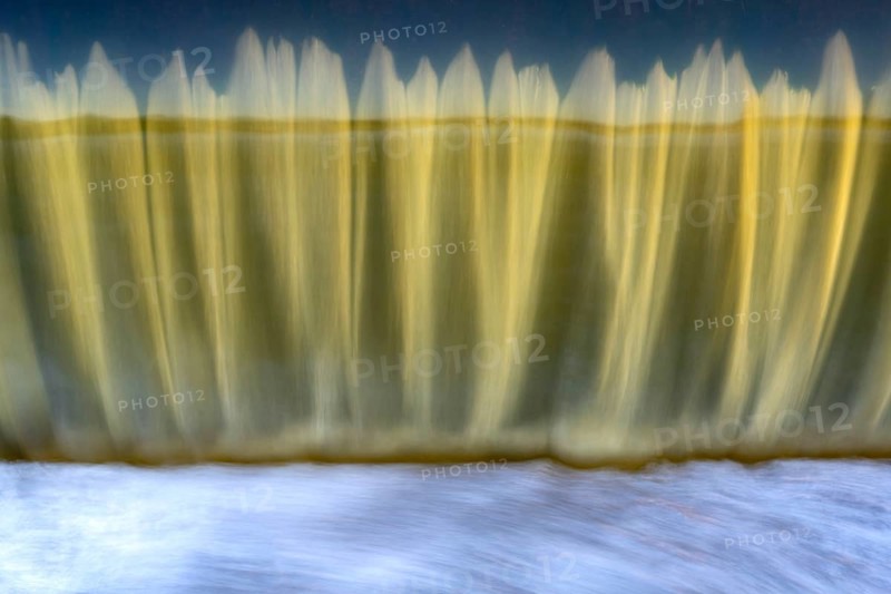 Water flows over a Hunte barrage, Wildeshausen, Lower Saxony, Germany