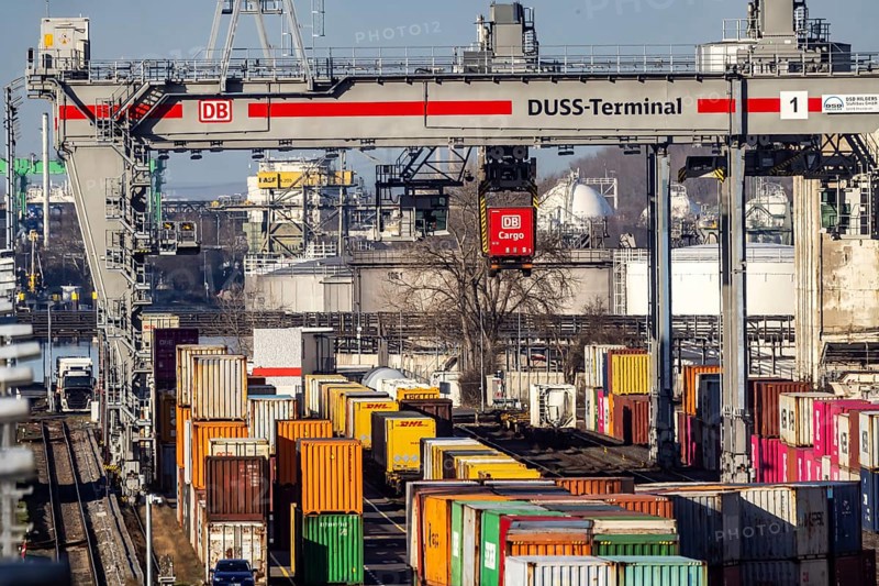 The port of Mannheim is one of the most important inland ports in Europe. The harbor basins stretch across the Rhine and Neckar. DUSS Terminal Deutsche Bahn AG with container from DB Cargo in the Mühlauhafen container terminal. Mannheim, Baden-Württemberg, Germany