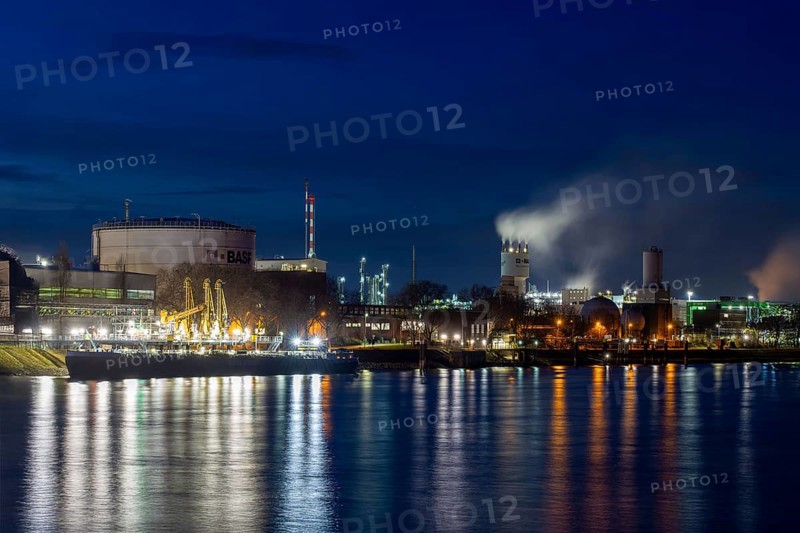 Evening shot of BASF in Ludwigshafen with the Rhine in the foreground