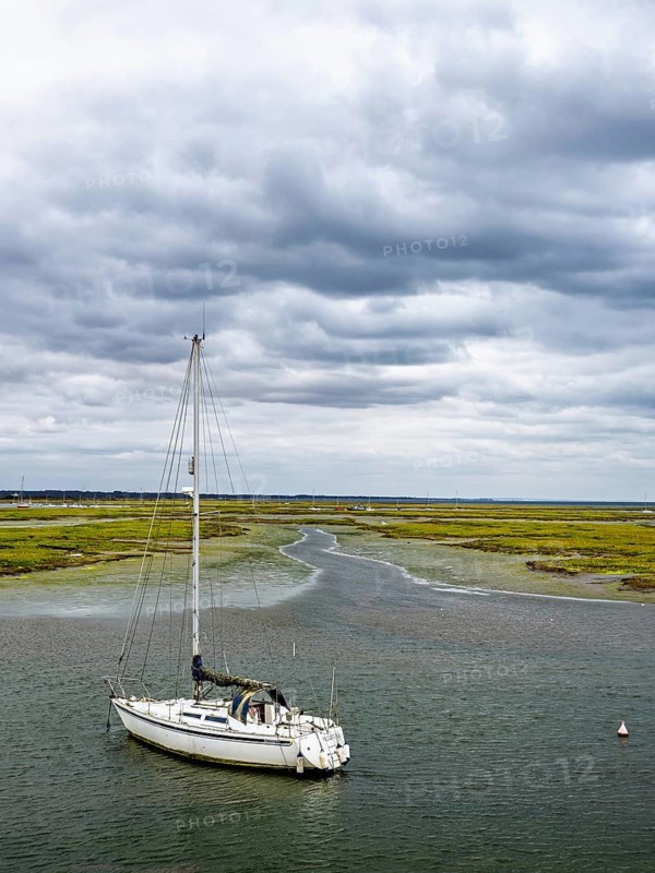 Boats and Marshes over Hurst Spit, Milford on Sea, Lymington, Hampshire, UK
