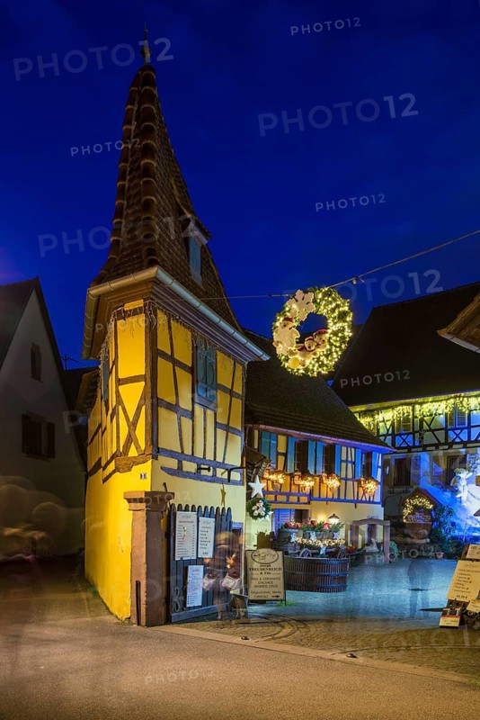 Houses illuminated and decorated for Christmas, Christmas market, blue hour, Eguisheim, Haut-Rhin department, Grand Est region, Alsace, France