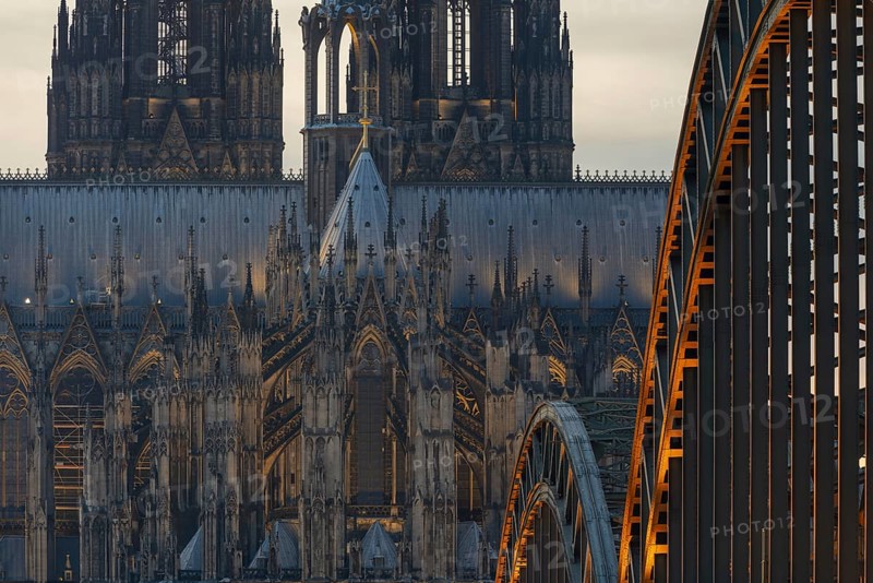 Evening atmosphere, Cologne Cathedral illuminated with LED lamps and the Hohenzollern Bridge, Cologne, North Rhine-Westphalia, Germany