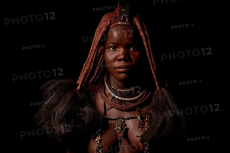 Portrait of an Ovahimba or Himba woman with traditional hairstyle, Kaokoland, Kunene Region, Namibia