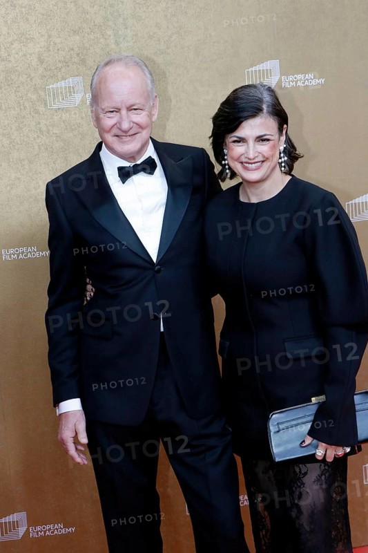 Stellan Skarsgard and Megan Everett arriving for the European Film Awards at the House of World Cultures in Berlin on 17.01.2026
