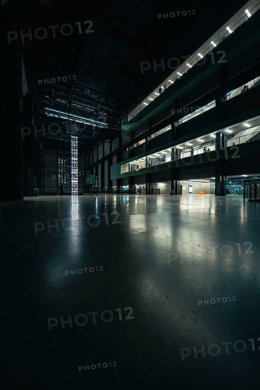 Expansive, dark room with industrial design, Tate Modern of Art, Lodon, United Kingdom
