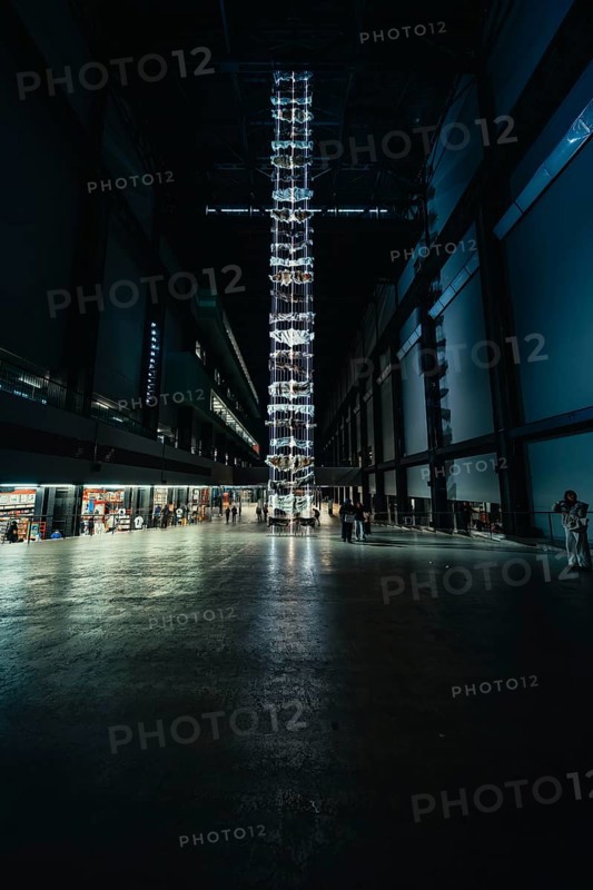 High room with luminous installation, dark industrial atmosphere, Tate Modern of Art, Lodon, United Kingdom