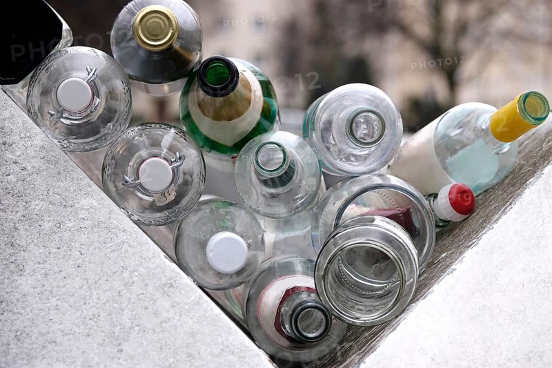 Empty bottles on a dumpster, Germany
