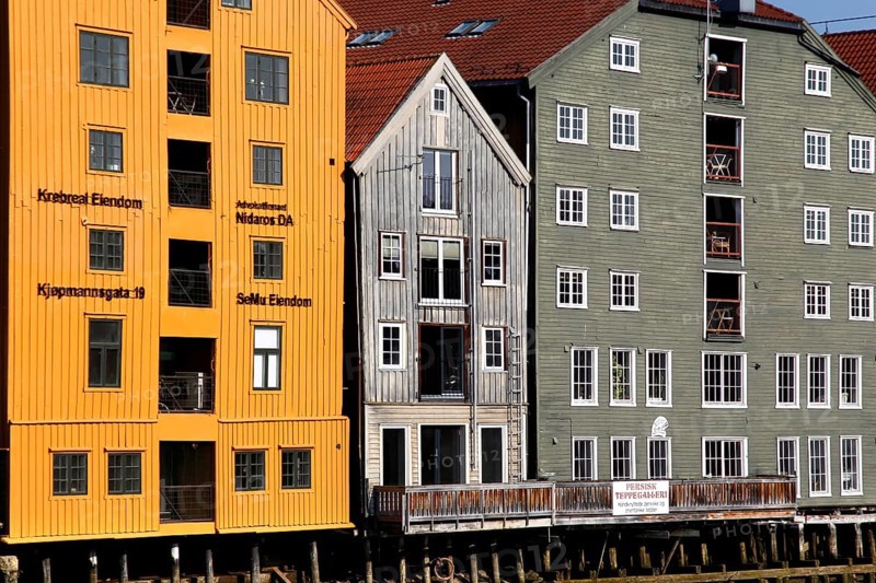Close-up of warehouses on Nidelva in Trondheim with colorful architecture, Trondheim, Norway