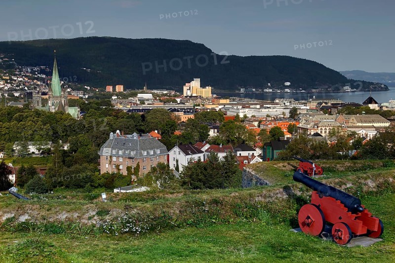 View from Kristianstenfestning over Trondheim with red cannon in the foreground, Trondheim, Norway