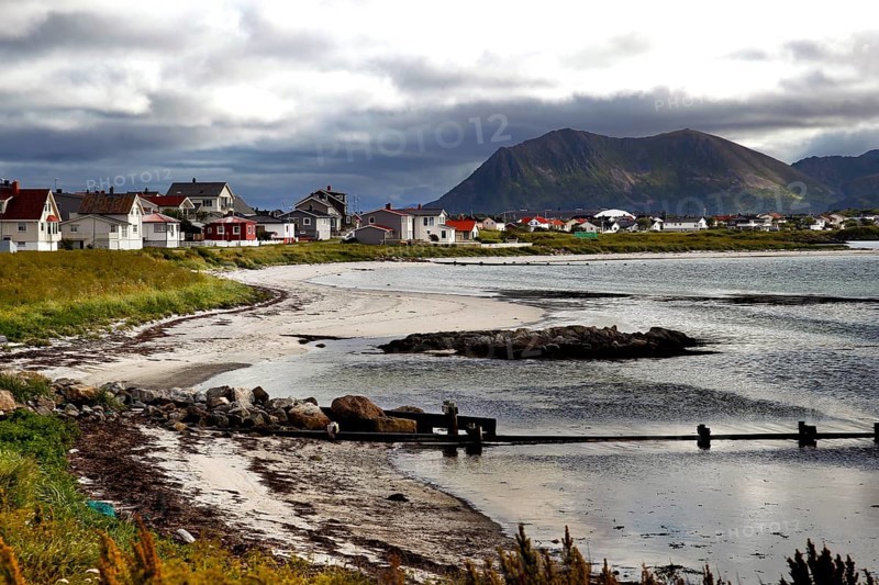 Idyllic seaside village landscape with mountains in the background in Andenes, Vesterålen, Norway