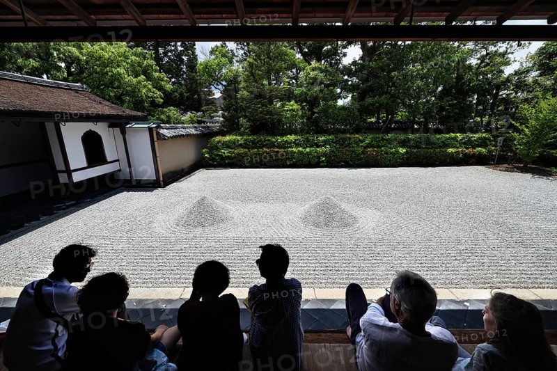 Group of people watching Zen garden with gravel in a temple, Kyoto, Daisen-in, Japan