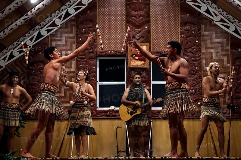 Maori perform a lively dance in traditional dress, Rotorua, Te Puia, New Zealand