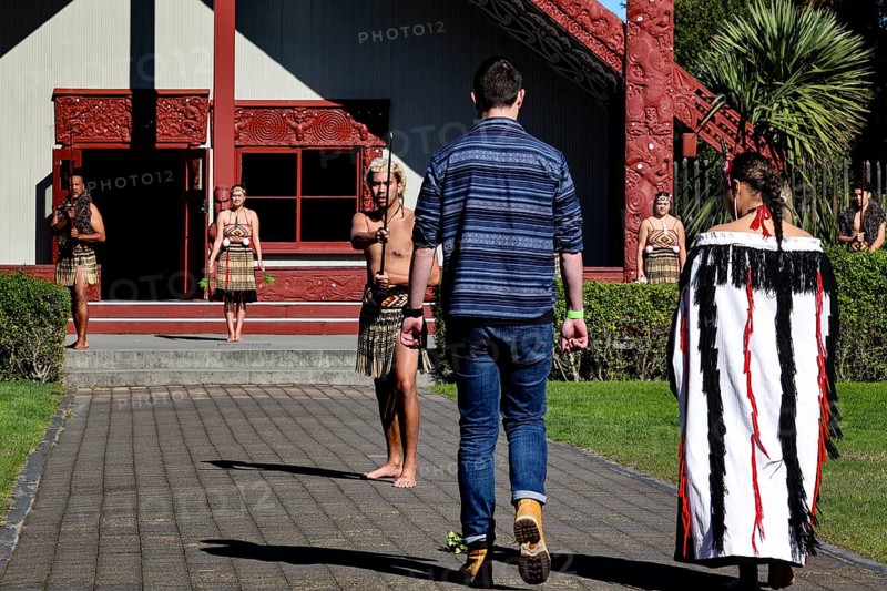 Traditional Maori welcome ceremony in front of a cultural house, Rotorua, Te Puia, New Zealand