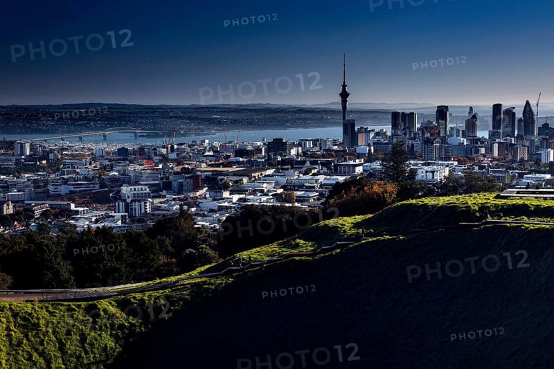 View of Auckland city and sea from Mt Eden under clear skies, Auckland, New Zealand
