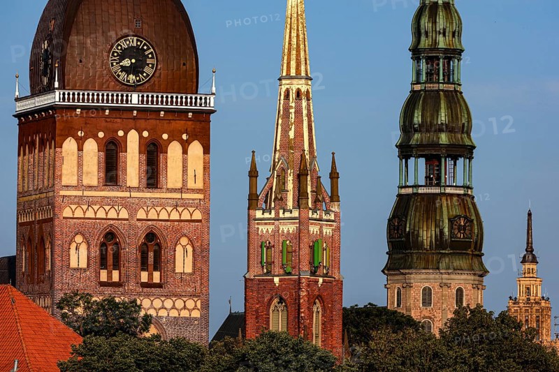 Towers of Riga churches and cathedral rise majestically on the Düna River, Riga, Latvia