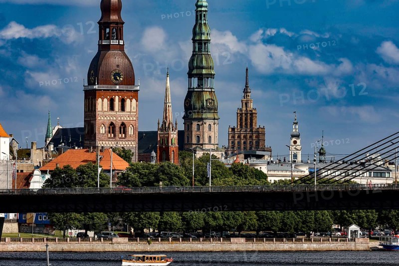 Riga's silhouette with churches on the Düna and distinctive bridge, Riga, Latvia
