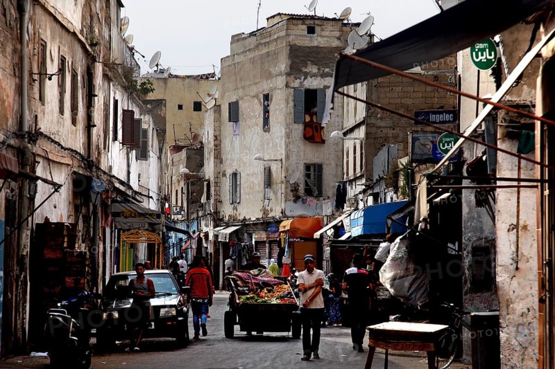 Narrow street with old buildings and traditional city life, Casablanca, Grand Casablanca, Morocco