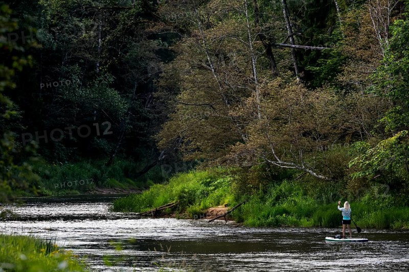 Fishermen near Kuku Klintis on the Gauja River, Gauja National Park, Latvia