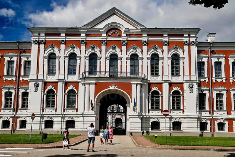 Historic castle with impressive architecture under blue sky, Jelgava, Latvia