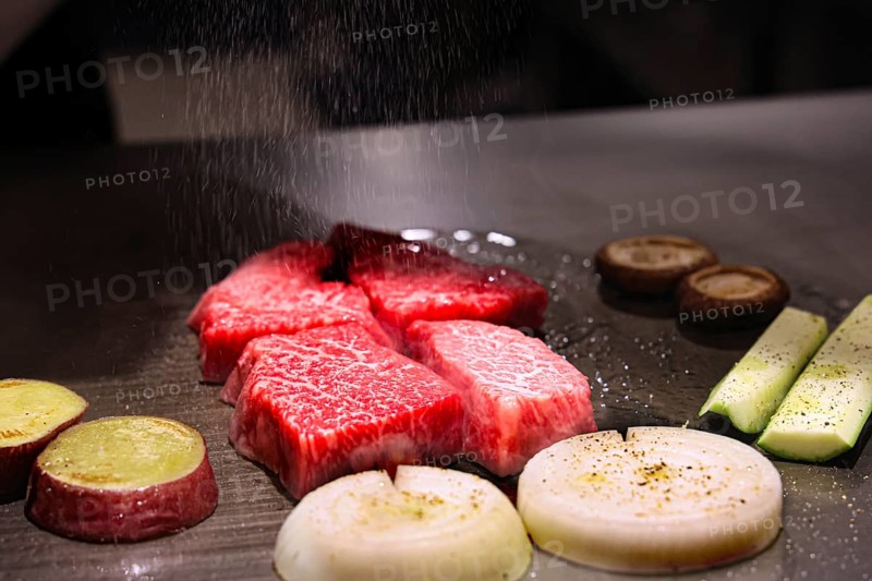 Preparation of Kobe beef and vegetables in Teppanyaki style, Kobe, Japan